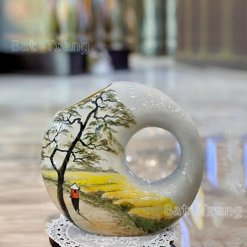 White ceramic donut vase with countryside scene from Bat Trang