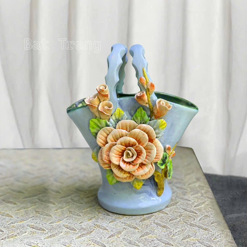 Blue handbag shaped ceramic vase with embossed roses from Bat Trang