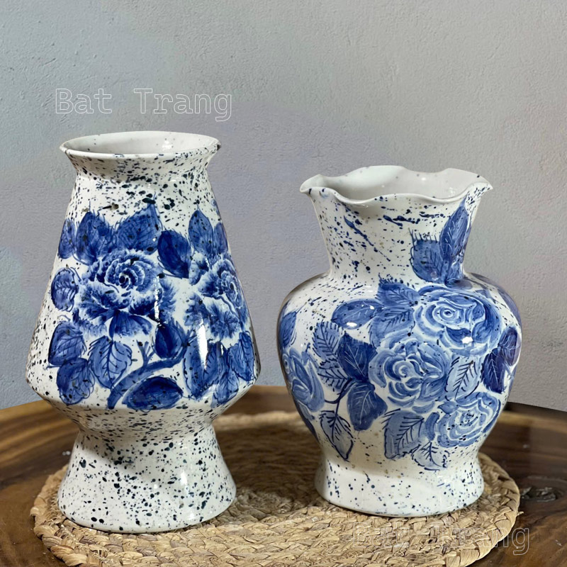 Close-up details of glossy blue floral vase pattern