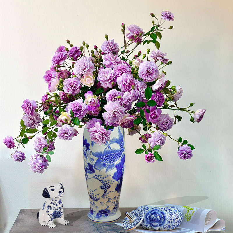 The Beauty of Tall Blue and White Vases for Centerpieces in Refined Interiors