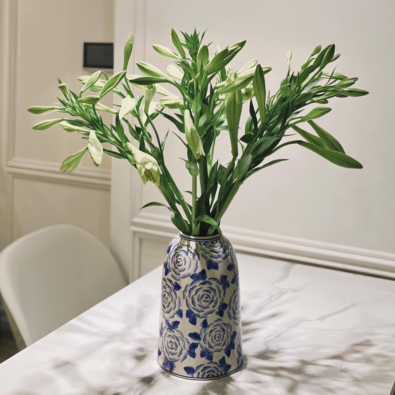 Elevate Your Table Decor with a Blue and White Flower Vase