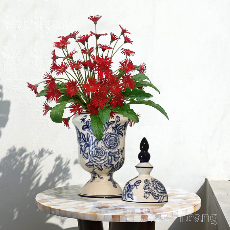 Blue and White Ceramic Vase With Lid Adorned With Rose Motifs