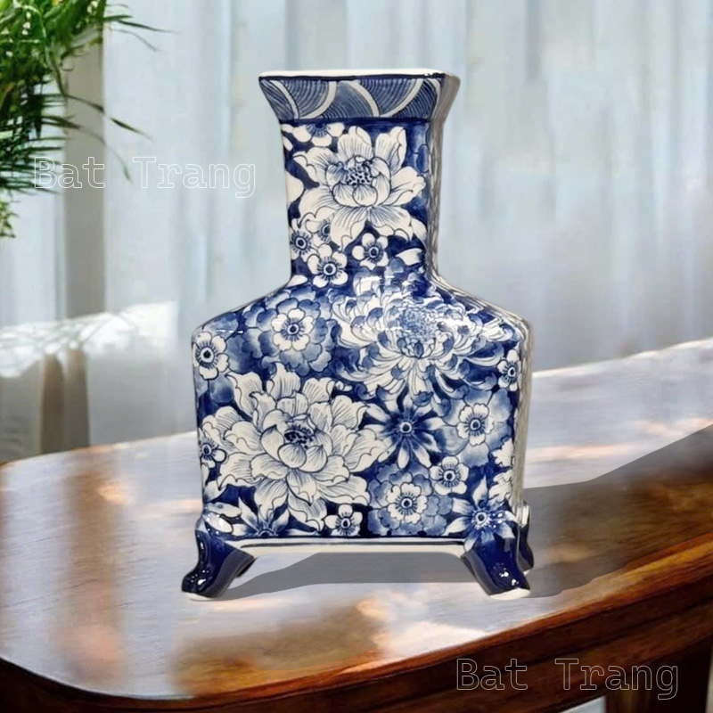 Unique Blue and White Ceramic Vase with Hand-Painted Floral Motifs