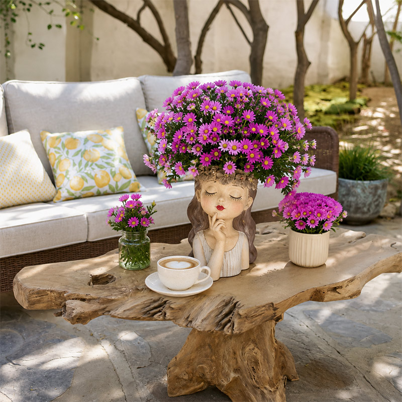 Girl Face Vase with Purple Daisies for an Outdoor Relaxation Space