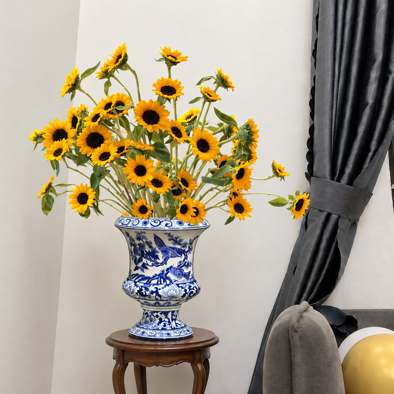 Decorative Blue and White Ceramic Urn with Sunflower Bouquet